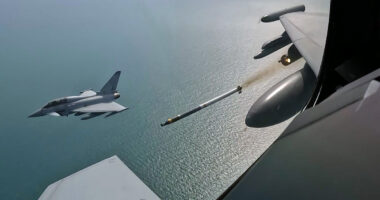 Image of a RAF Typhoon aircraft, seen here firing the Advanced Precision Kill Weapon System (APKWS). Air-to-air live firing of the APKWS system, was carried out during trials in the UK in April 2026 by 41 Test and Evaluation Squadron. British citizens and regional partners will be better protected against drone attacks as the Royal Air Force deploys a new low-cost anti-drone weapon on operations in the Middle East. The new Advanced Precision Kill Weapon System (APKWS) will be fitted to RAF Typhoon fighter jets so that they can destroy targets precisely and at a fraction of the price of missiles currently used. Rapid procurement and testing work by the Ministry of Defence and industry partners BAE Systems and QinetiQ has enabled the system to move from testing to deployment on operations in less than two months. March saw a successful test strike on a ground-based target, and RAF Typhoon pilots from 41 Test and Evaluation Squadron conducted successful air-to-air firing in April, demonstrating the system’s ability to defend against drone attacks. The system has now been deployed on operations in the Middle East with sorties flown by 9 Squadron RAF Typhoon fighter jets as part of the missions to defend British people, interests and partners from threats.