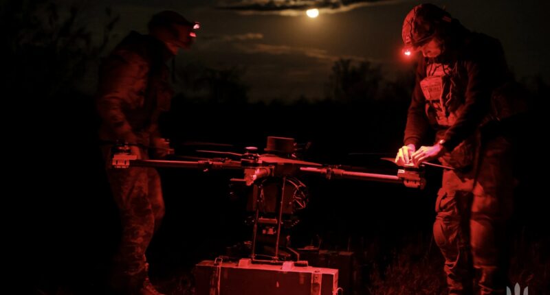 Troops setting up a drone at night. Photo: Ukrainian Ministry of Defence