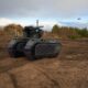 A Tracked Hybrid Modular Infantry System (THeMIS) unmanned ground vehicle firing on a drone. Photo: Milrem Robotics
