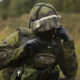 A Finnish Navy Soldier assigned to Reserve Force Protection Company uses a radio to communicate during a bilateral simulated field artillery training in Upinniemi, Finland, Aug. 18, 2022. The Kearsarge Amphibious Ready Group and 22nd MEU, under the command and control of Task Force 61/2, is on a scheduled deployment in the U.S. Naval Forces Europe area of operations, employed by U.S. Sixth Fleet to defend U.S., allied and partner interests. (U.S. Marine Corps photo by Lance Cpl. Tyler M. Raab)