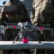 U.S. Army Spc. Michael Fish, a unmanned aircraft system (UAS) operator from the 173rd Airborne Brigade prepares to fly a Skydio X10 for a M67 grenade drop in the Grafenwoehr Training Area, Germany, June 25, 2025. Soldiers from 7th Army Training Command, the Joint Multinational Training Group-Ukraine and 173rd Airborne Brigade all worked together to make this the first live grenade drop from a UAS in the U.S. Army. (U.S. Army photo by Sgt. Collin Mackall)