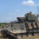 A Bradley infantry fighting vehicle mounted with FireAnt ground drones