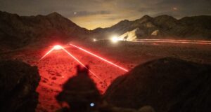 U.S. Marines with 2nd Battalion, 4th Marine Regiment, 1st Marine Division conduct a night live-fire range during Service Level Training Exercise at Marine Corps Air-Ground Combat Center, Twentynine Palms, California, Dec. 17, 2025. SLTE is designed to be a challenging, realistic training environment that produces combat-ready forces capable of operating as an integrated Marine Air Ground Task Force across all domains of military operations. (U.S. Marine Corps photo by Cpl. Christian Cutter)