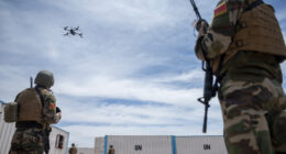 Members of the Moroccan Groupement des Forces Spéciale set up a drone to conduct reconnaissance during a Joint Combined Exchange Training (JCET) at Tifnit Training Base, Morocco, May 13, 2026. JCETs strengthen interoperability and hone crucial skills by integrating U.S. and partner forces in realistic training scenarios. (U.S. Air Force photo by Staff Sgt. Enrique Barcelo)